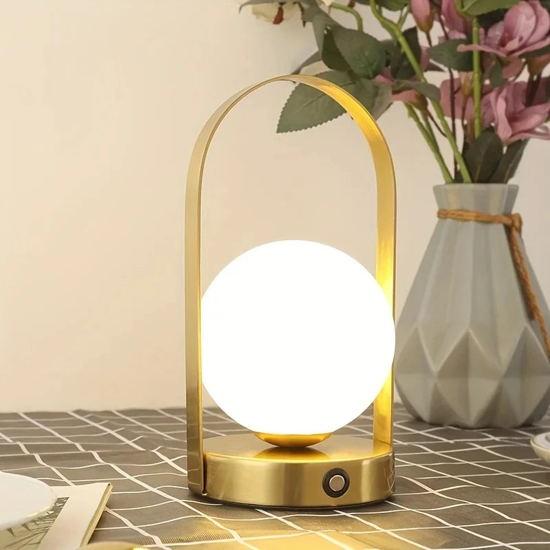 https://ae01.alicdn.com/kf/Sb6968987ee42428c8947a3ebb3860c29X/Portable-Outdoor-Hanging-Metal-Table-Lamp-Dimmable-Wireless-Table-Lamp-with-USB-Rechargeable-Bedroom-Bedside-Night.jpg