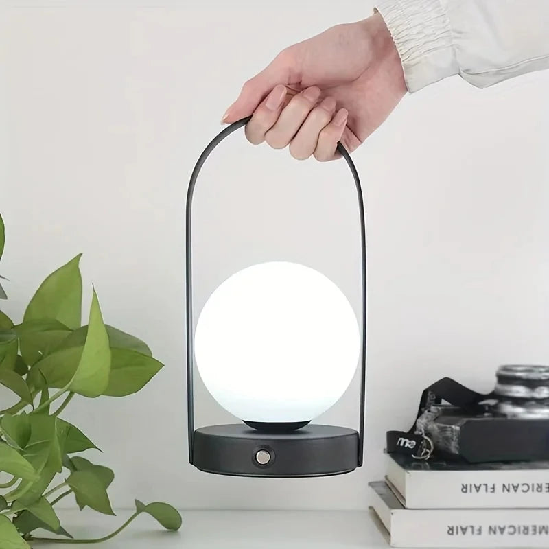 https://ae01.alicdn.com/kf/Sc0a3e4a8664c44e5b188ba7603ac64d4k/Portable-Outdoor-Hanging-Metal-Table-Lamp-Dimmable-Wireless-Table-Lamp-with-USB-Rechargeable-Bedroom-Bedside-Night.jpg